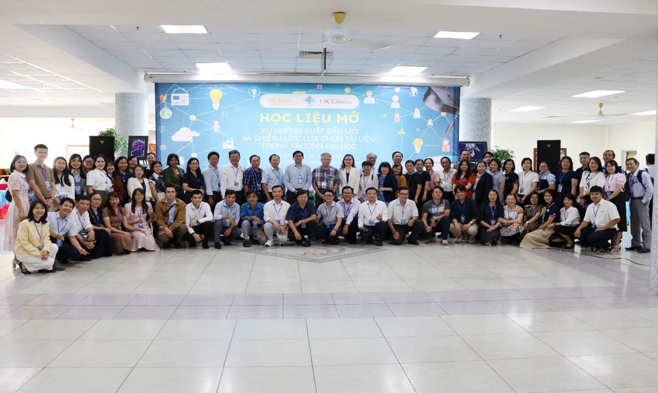 A group of people posing for a photo

Description automatically generated